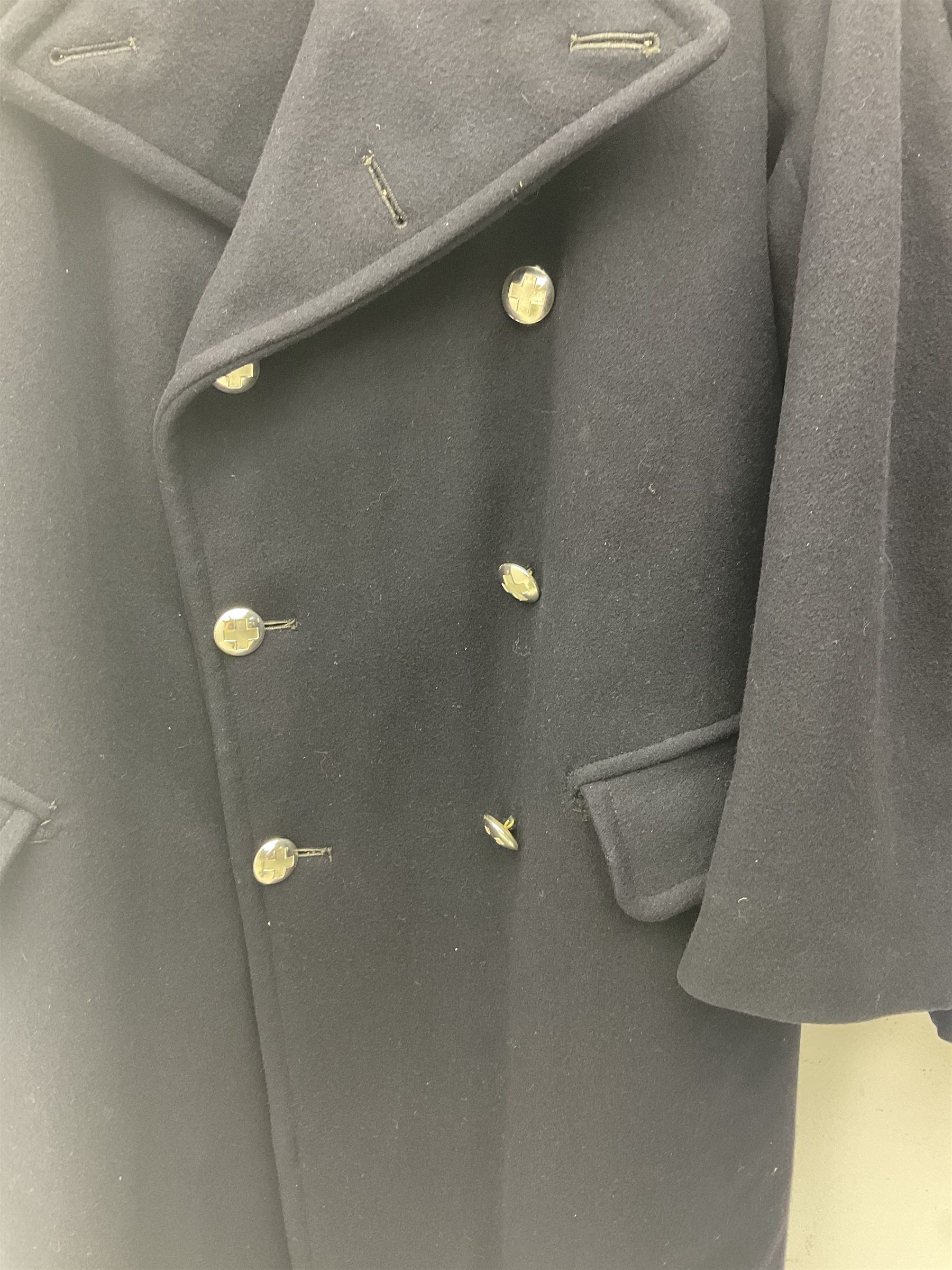 1950s British Red Cross North Yorkshire dress uniform comprising tunic, trousers, greatcoat and visor cap; bears manuscript label '1956 Ware'