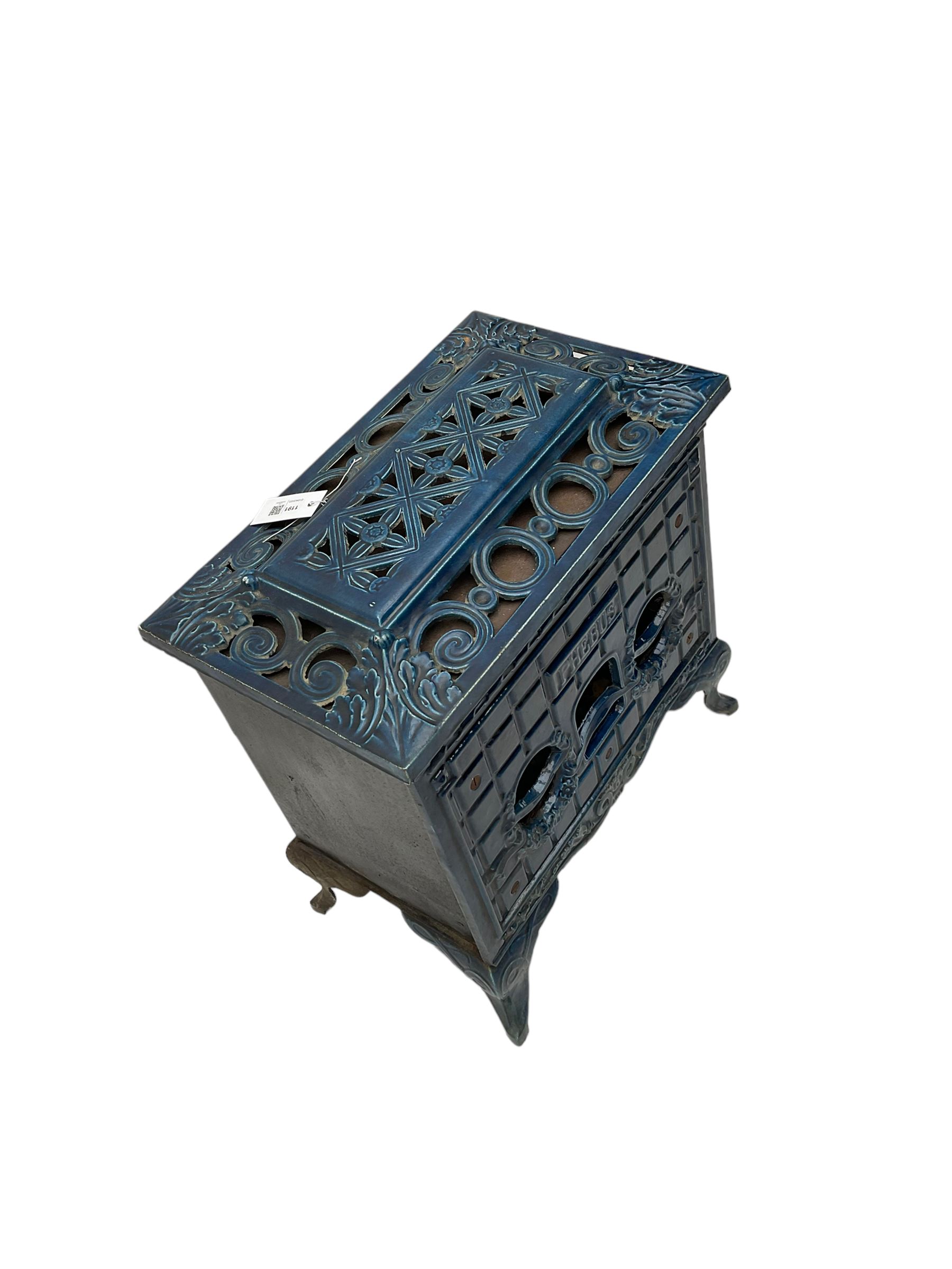 Poeles Nanquette - Art Deco 'Phebus' French enamel wood burning stove, indigo colour with pierced scrollwork decoration and acanthus leaves, on cabriole supports