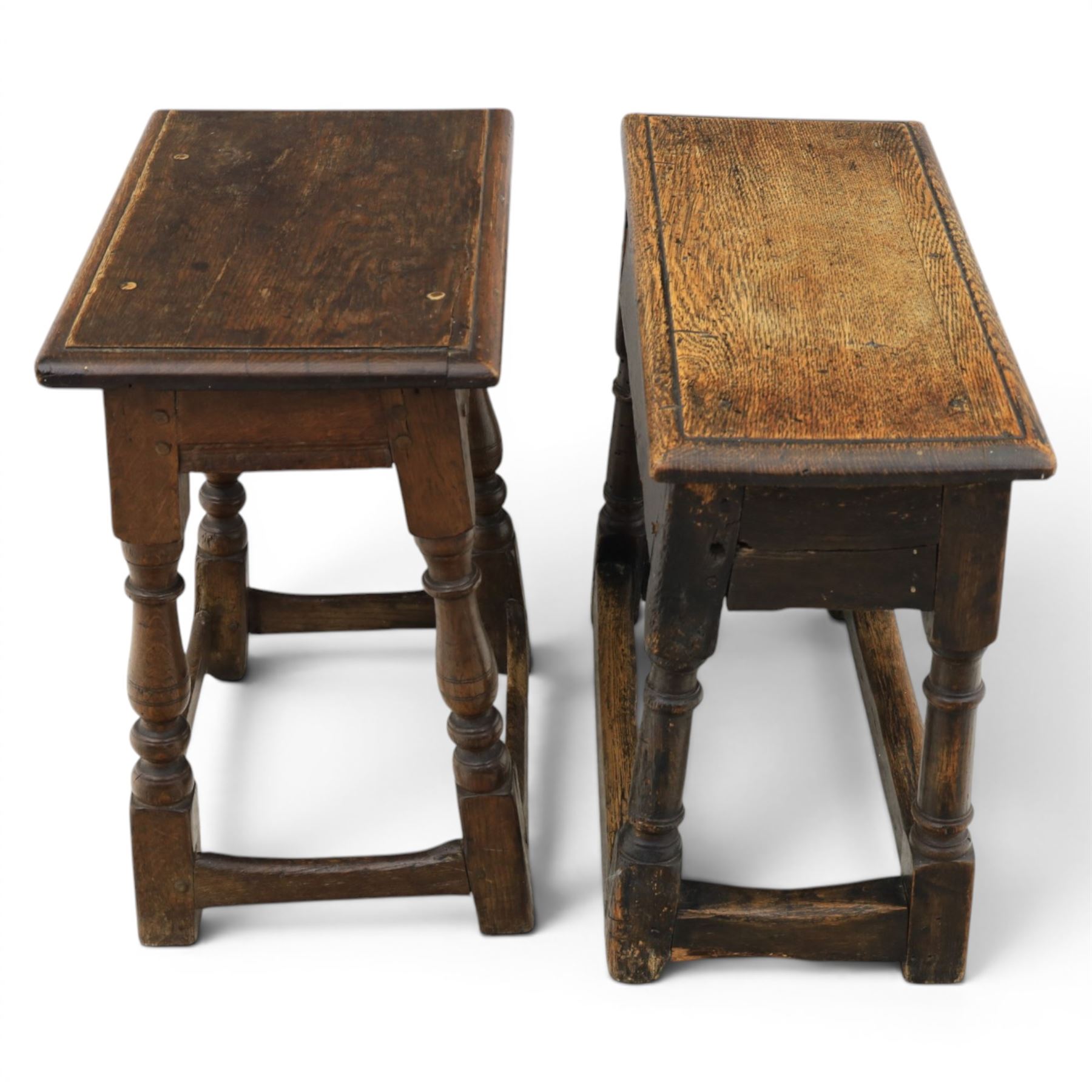 Two 19th century oak joint stools raised on turned supports united by stretchers
