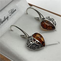 Pair of silver Baltic amber heart pendant earrings, stamped 925, boxed 