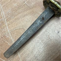 WW2 Japanese Army officer's shin gunto/katana sword with 68.5cm steel single edged blade, foliate cast brass tsuba, bound fish-skin grip with brass mounts, inscribed marks to both sides of tang; in lacquered wooden scabbard with brass mounts and locking button L97cm overall