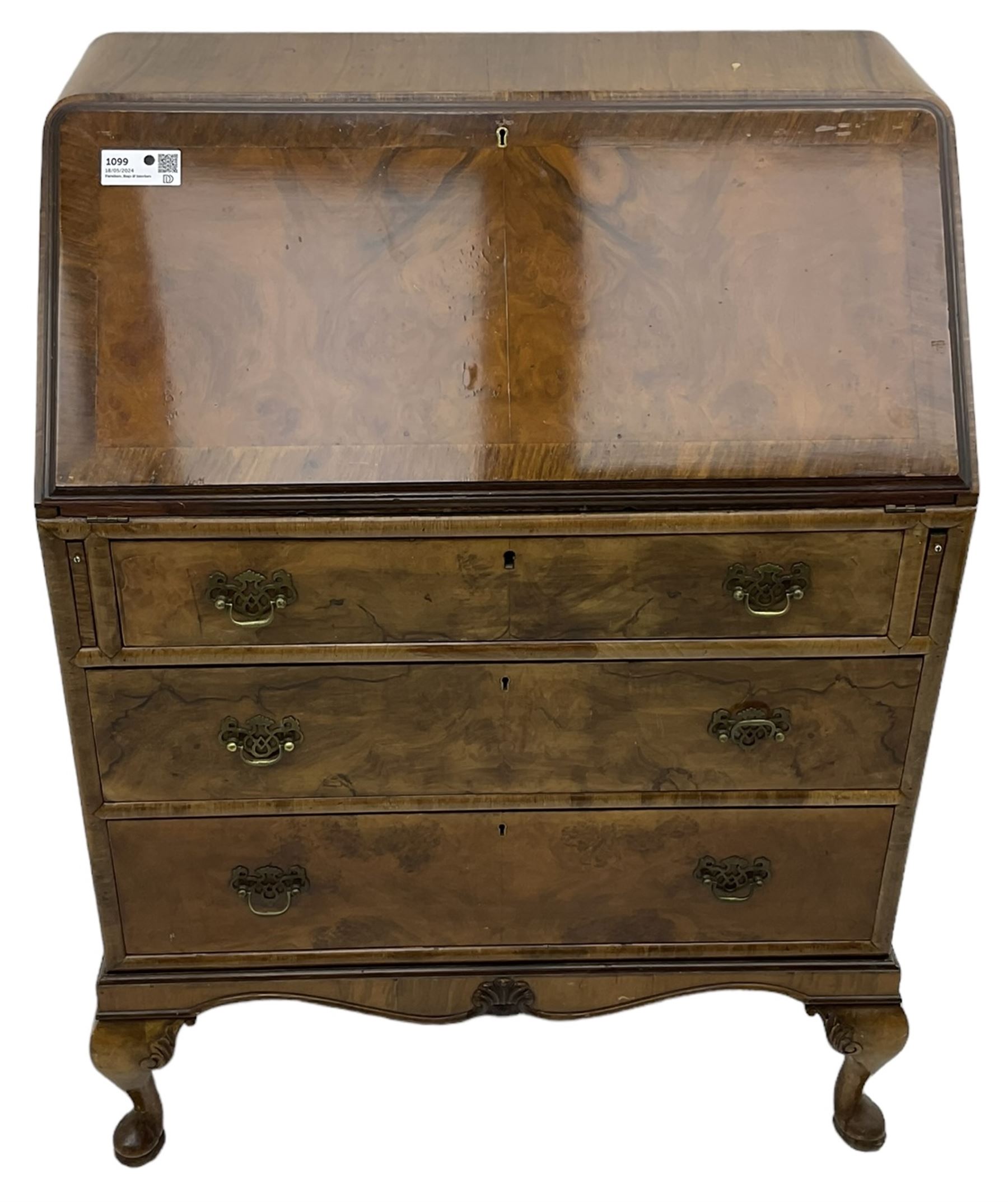 Mid-20th century walnut bureau desk, figured fall front enclosing fitted interior, three graduating drawers below, on cabriole feet