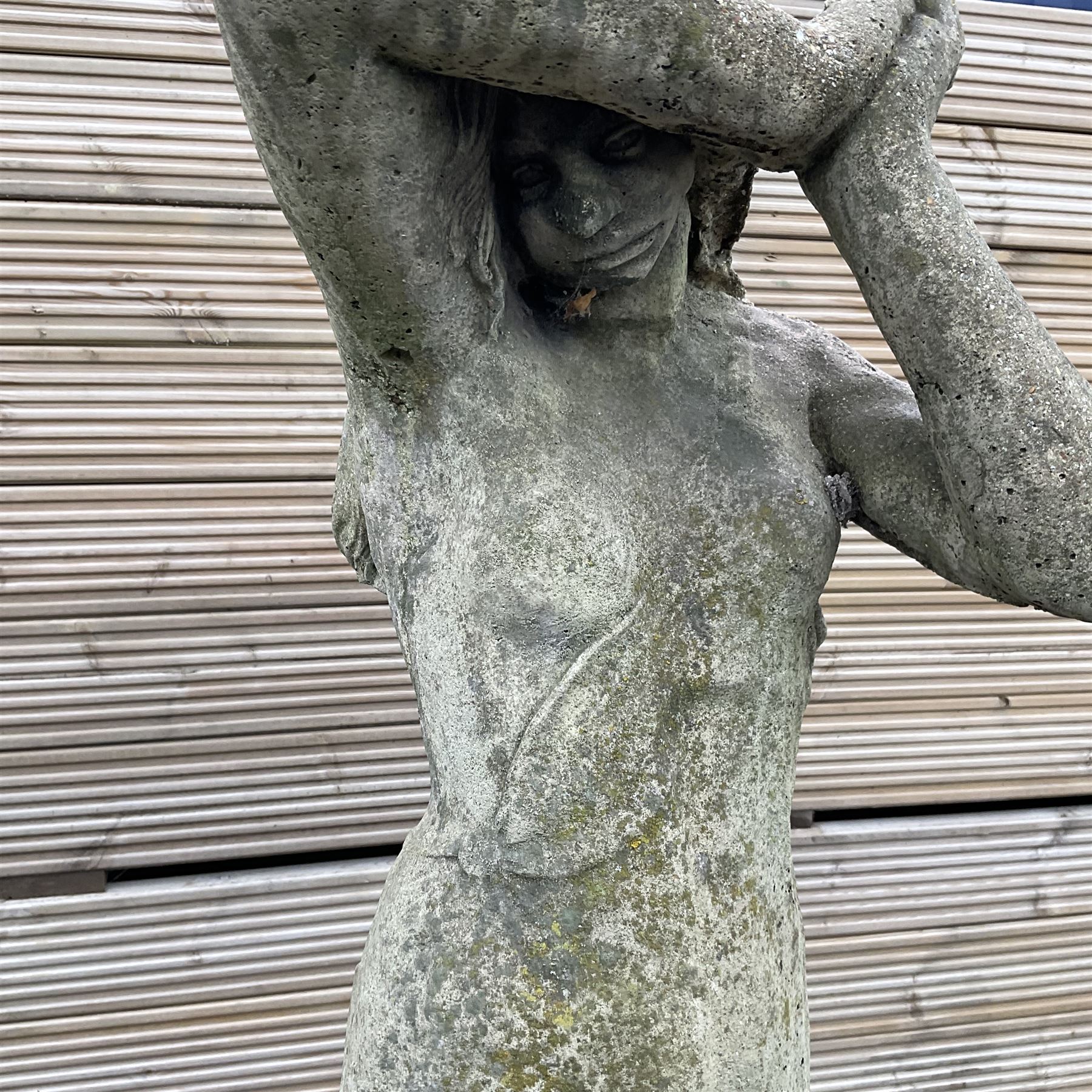 Cast stone garden figure of a woman with arms raised - THIS LOT IS TO BE COLLECTED BY APPOINTMENT FROM DUGGLEBY STORAGE, GREAT HILL, EASTFIELD, SCARBOROUGH, YO11 3TX