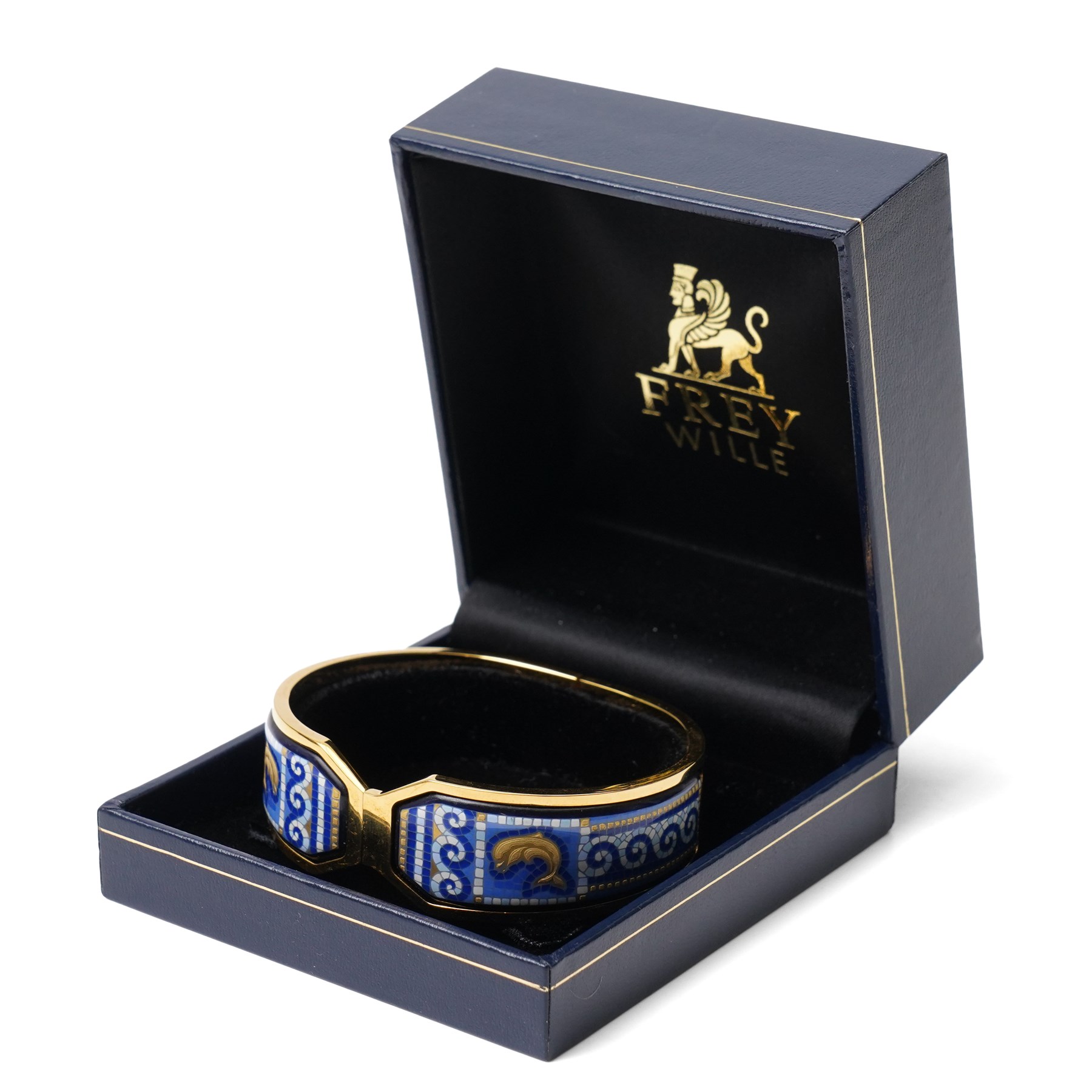 Frey Wille gold plated and enamel suite of jewellery from the Dolphins of Poseidon collection, including a pair of hoop earrings, hinged bangle and pendant on snake chain necklace, all boxed
