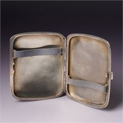 Early 20th century Continental silver and enamel cigarette case of rectangular cushion form, the front enamelled with a capercaillie in a Scottish woodland scene, marked 935, 9cm in length