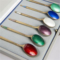 Set of six Danish silver-gilt and guilloche enamel demitasse spoons by Anton Michelsen, stamped A. Michelsen, Sterling, Denmark, with import marks for London, R C P Ltd, in fitted case