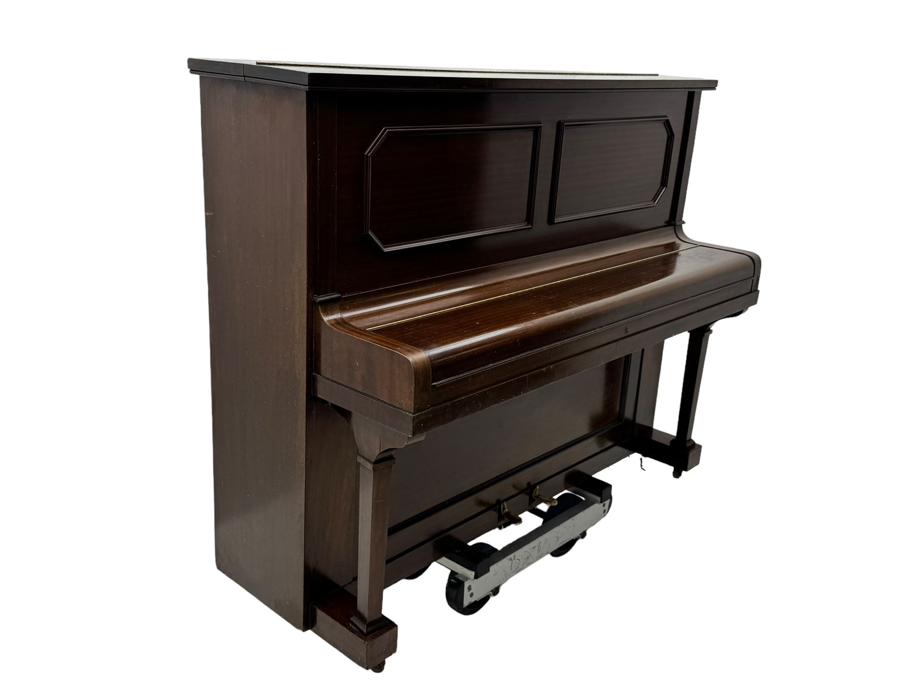 Waddington - Edwardian mahogany upright piano, rectangular top with panelled front, rounded key cover, makers name on fallboard, raised on bracket supports with castors