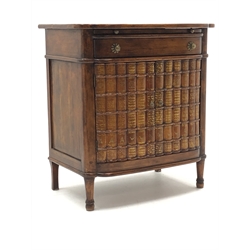  Regency style bow front mahogany side cabinet, with brushing slide and frieze drawer above two faux book spine doors, with brass handles on peg turned supports, W75cm, D48cm, H83cm   