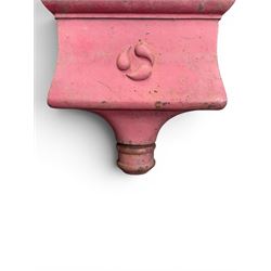 Edwardian heavy cast iron rainwater hopper, with water motif, painted in pale red finish