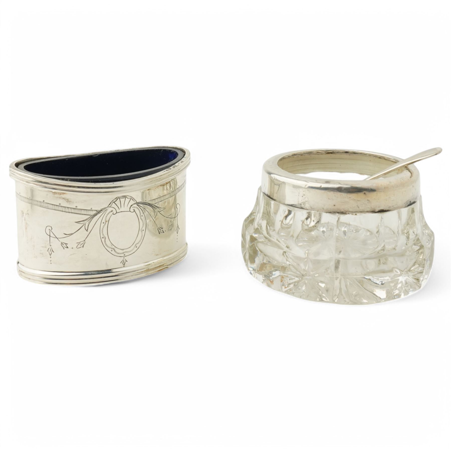 Silver three piece oval condiment set with engraved decoration Birmingham 1961, pierced silver mustard pot Chester 1901, silver pepperette and silver mounted glass salt