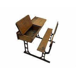 Early 20th century school desk, pine and cast iron, two sectional with hinged lids, the irons marked ‘Addision Ltd.’