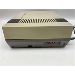 Nintendo Entertainment System (1985) console with two controllers, accessories and instruction booklet. NES Games ‘Duck Hunt’ with Nintendo Zapper gun, ‘Pinball’ and ‘Super Mario Bros.’, all with original sleeves and instruction booklets. NES game ‘Super Mario Bros. 2’ cartridge only