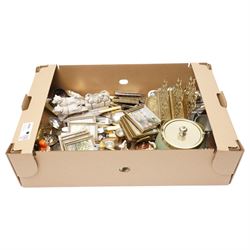 Collection of silver plated cutlery, silver candlesticks and pair of silver sugar tongues,...