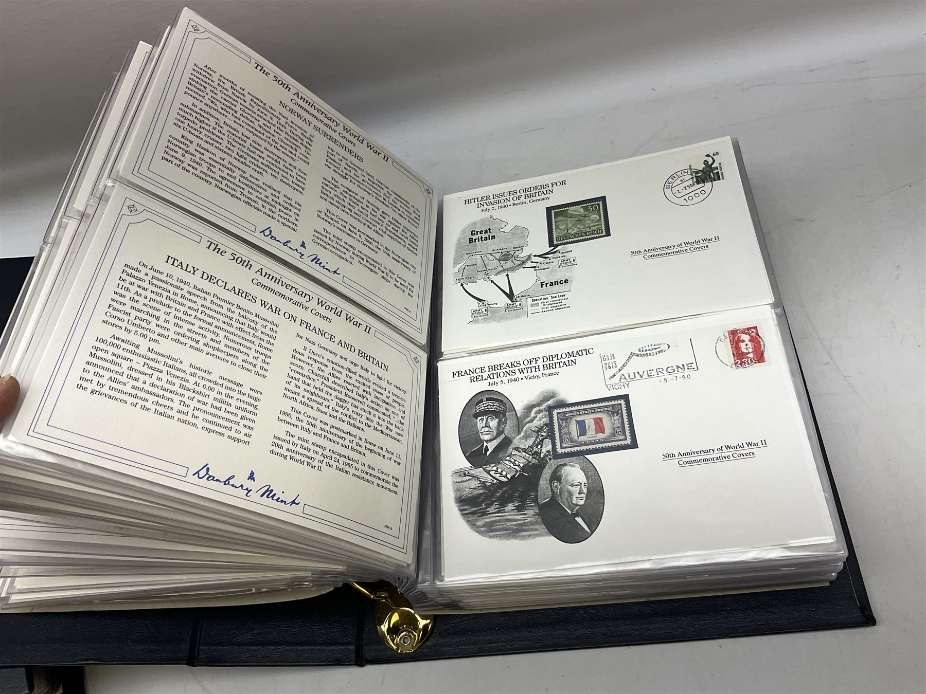 Three albums of 'The 50th Anniversary World War II Commemorative Covers Collection', housed in the official Danbury Mint folders