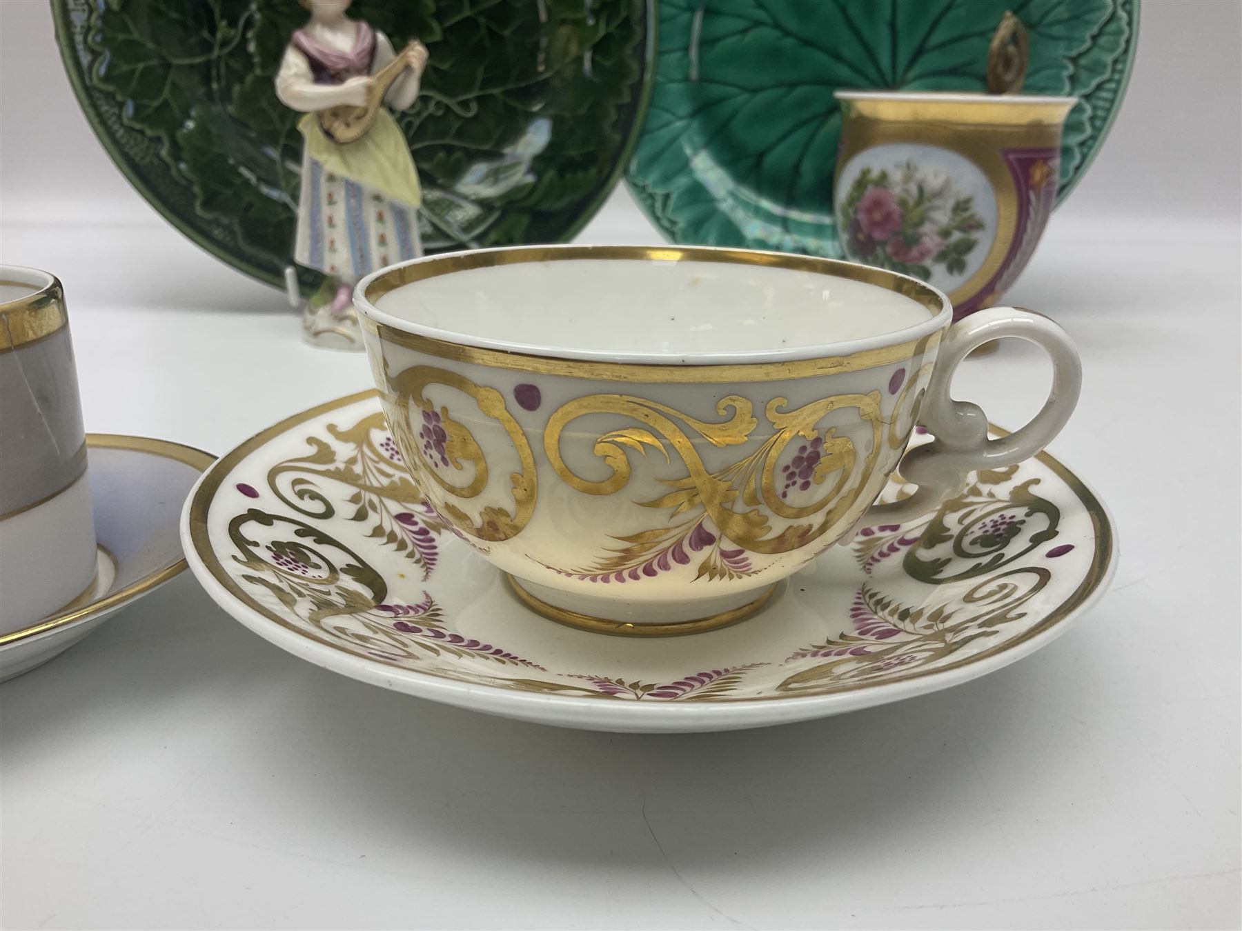 Wedgwood majolica leaf plate, together with another similar and together with a Dresden figure, etc 