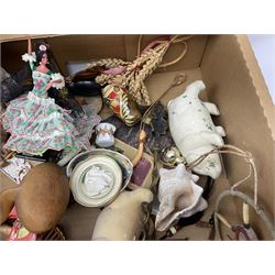 Large quantity of dolls to include oriental examples, native examples, knitted examples etc in four boxes