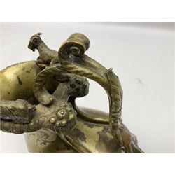 19th century Grand Tour bronze askos wine pitcher, of typical form with putto mounted scrolling foliate handle and two recumbent goats to the rim, H17cm W16cm