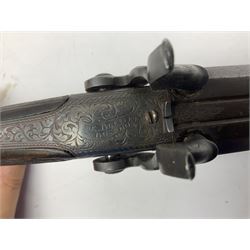 Early 19c percussion double barrel Howdah pistol by J. Blisset London, c1840s, approximately 50 calibre, 10.5cm octagonal monobloc barrels with captive swivel ramrod under, finely chequered walnut stock, engraved hammers, lock plates, tang and trigger guard, butt plate with hinged cap compartment, vacant white metal oval escutcheon L25.5cm overall