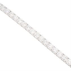 18ct white gold diamond bracelet, four claw set with fifty-one round brilliant cut diamonds, stamped 750, total diamond weight approx 6.35 carat