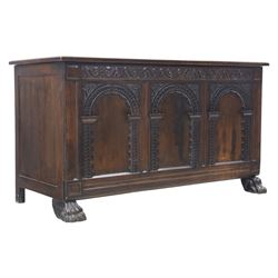 17th century design panelled oak blanket chest, hinged top above carved triple arch frieze...