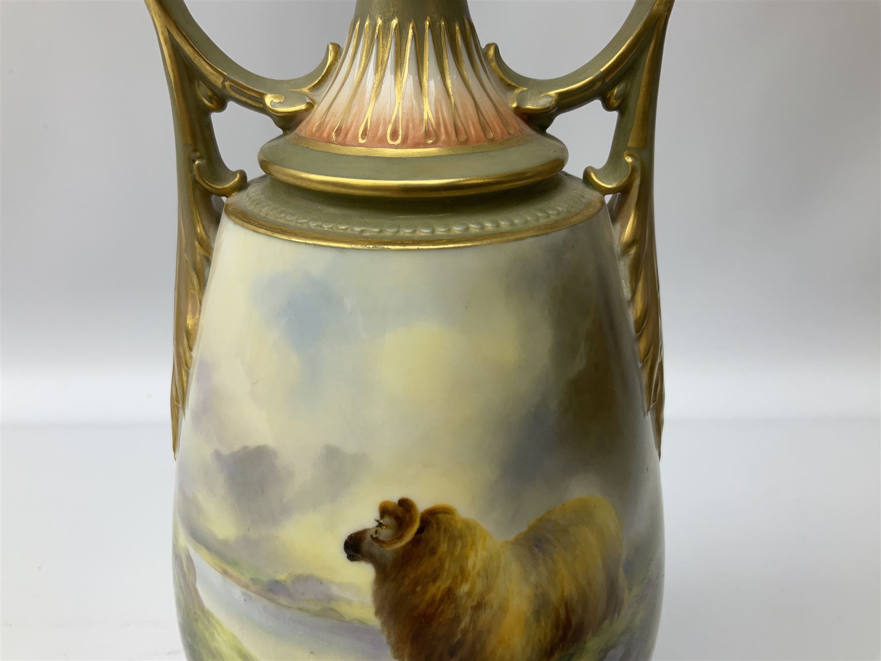 Early 20th century Royal Worcester vase decorated by Harry Davis, of ovoid form with twin acanthus mounted handles and waisted high neck supporting a domed cover, upon a circular foot, the body hand painted with sheep in a highland landscape, signed H Davis, with puce printed marks beneath including shape number 2425, and date code for 1907, H27.5cm