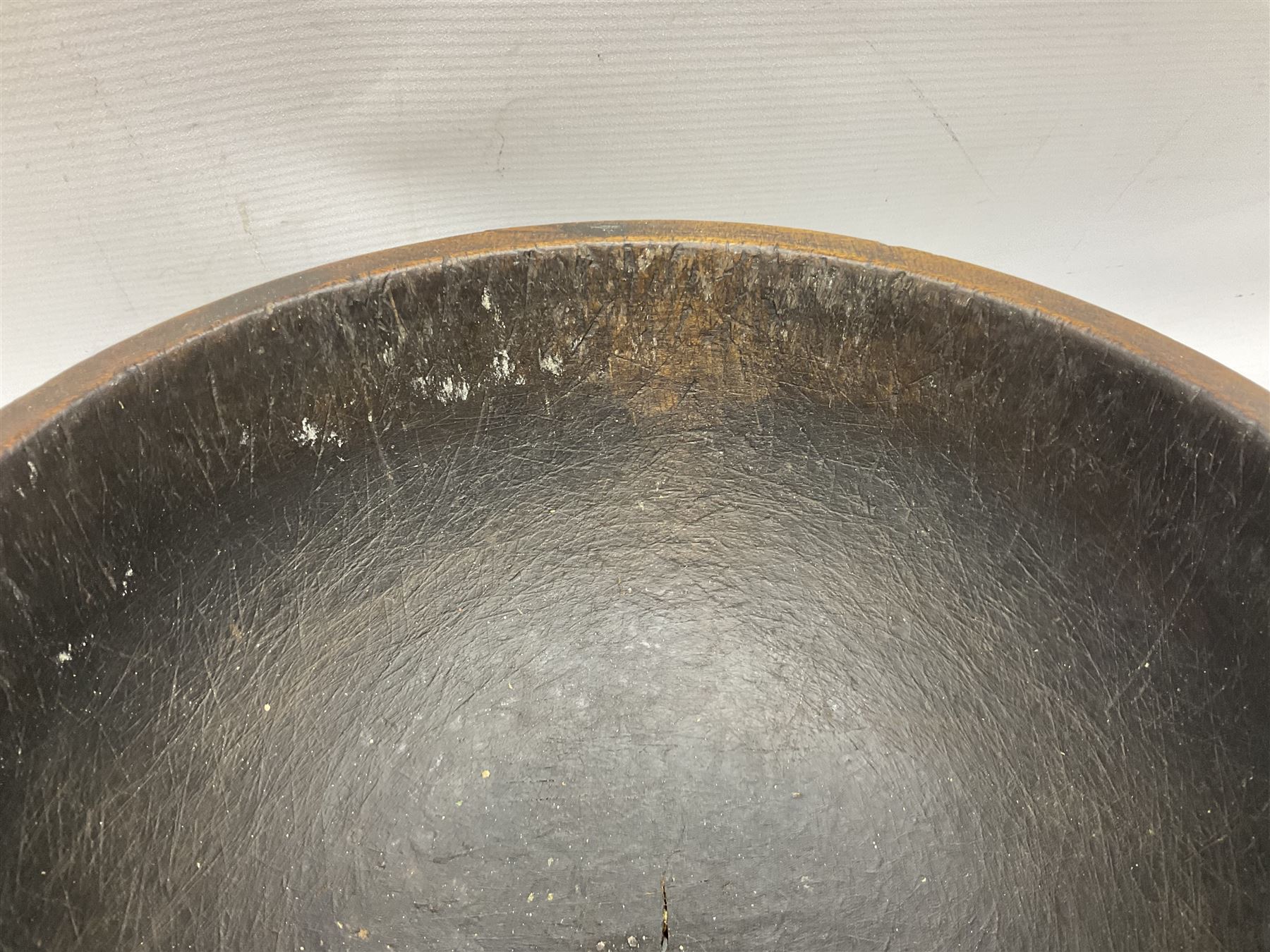 19th century pole lathe turned sycamore bowl, the interior housing lead liner, the exterior decorated with bands of deep grooves, D28cm