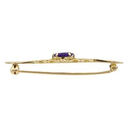Gold green paste pierced ring and a gold oval amethyst openwork brooch, both hallmarked 9ct 