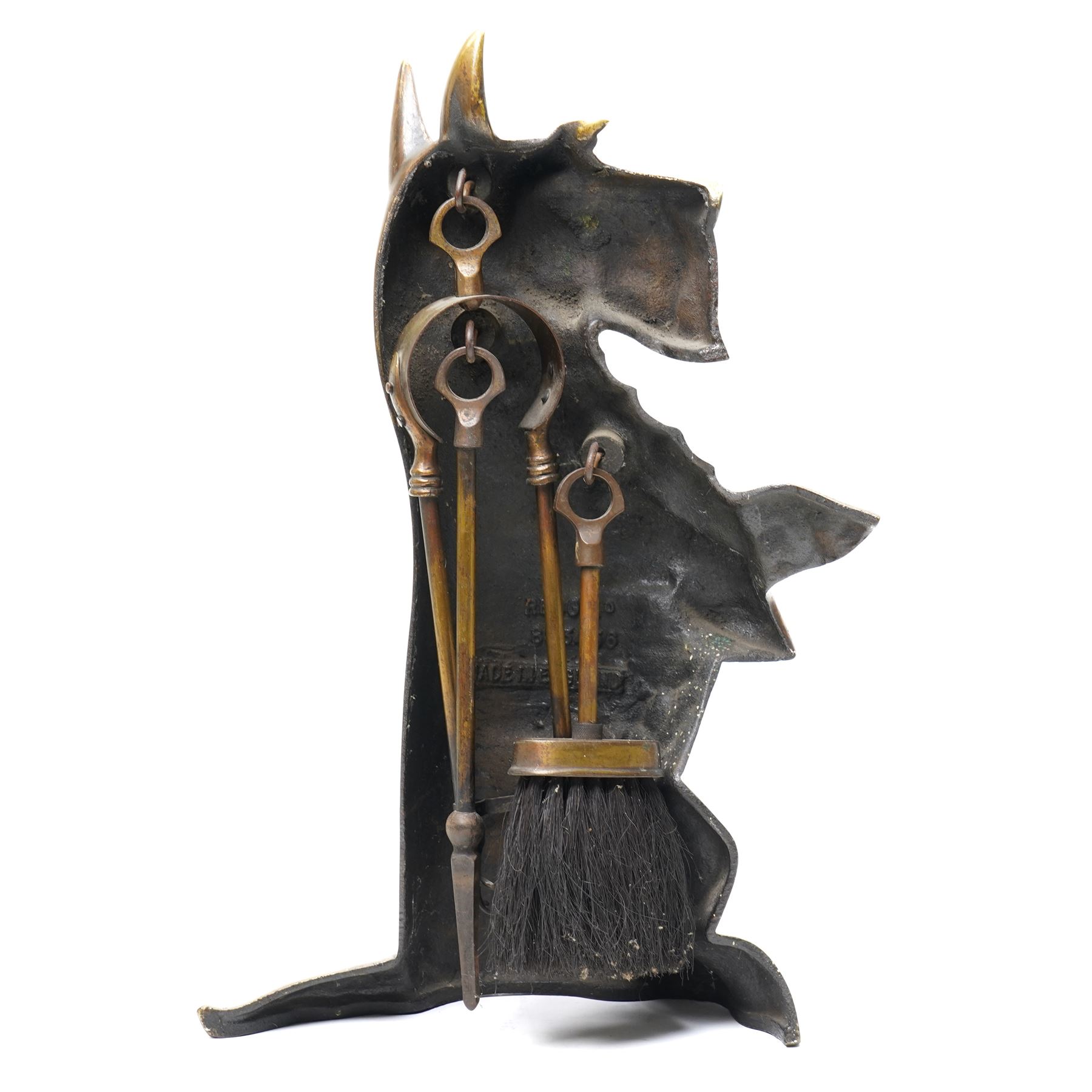 Brass Scottish Terrier fireside companion with accessories, H41cm; with patinated brass Smooth Fox Terrier, H13cm and small silver plated Smooth Fox Terrier, H6cm (3)