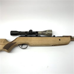 .22 air rifle with under lever action, chequered pistol grip, adjustable butt, camo covered barrel and Nikko Stirling 6x scope L120cm overall