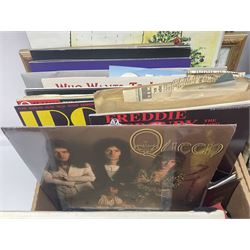 Mostly Queen and Freddie Mercury interest items, including pin badges, newspaper cuttings, diecast 'promotional' vehicles, special edition Pop Rocks figure of Freddie Mercury, VHS tapes, two charity certificates signed by Brian May and Roger Taylor, poster etc, in two boxes 