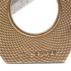 Asprey, 9ct gold hexagonal cigar cutter, hallmarked, with engine turned decoration  