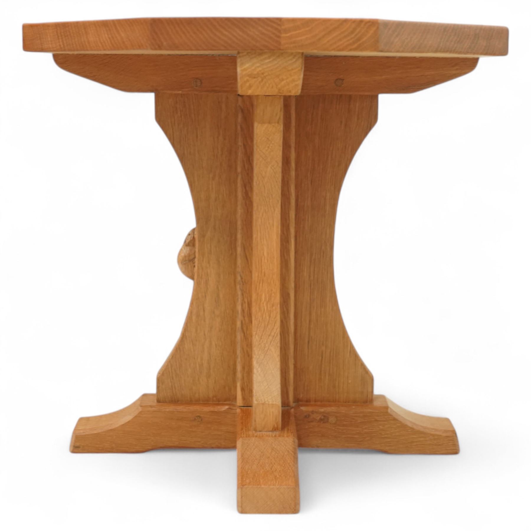 Mouseman - oak coffee table, octagonal adzed top on cruciform base and sledge feet, carved with mouse signature, by the workshop of Robert Thompson, Kilburn
