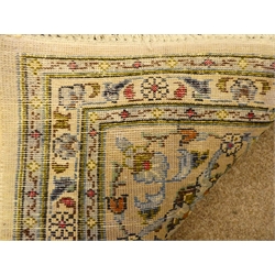  Kashan beige ground rug, central medallion, floral field and repeating border, 326cm x 220cm  
