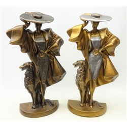  Two Austin Art Deco style bronzed figures of a woman stood beside a Borzoi dog, designed by A. Danel, H50cm   