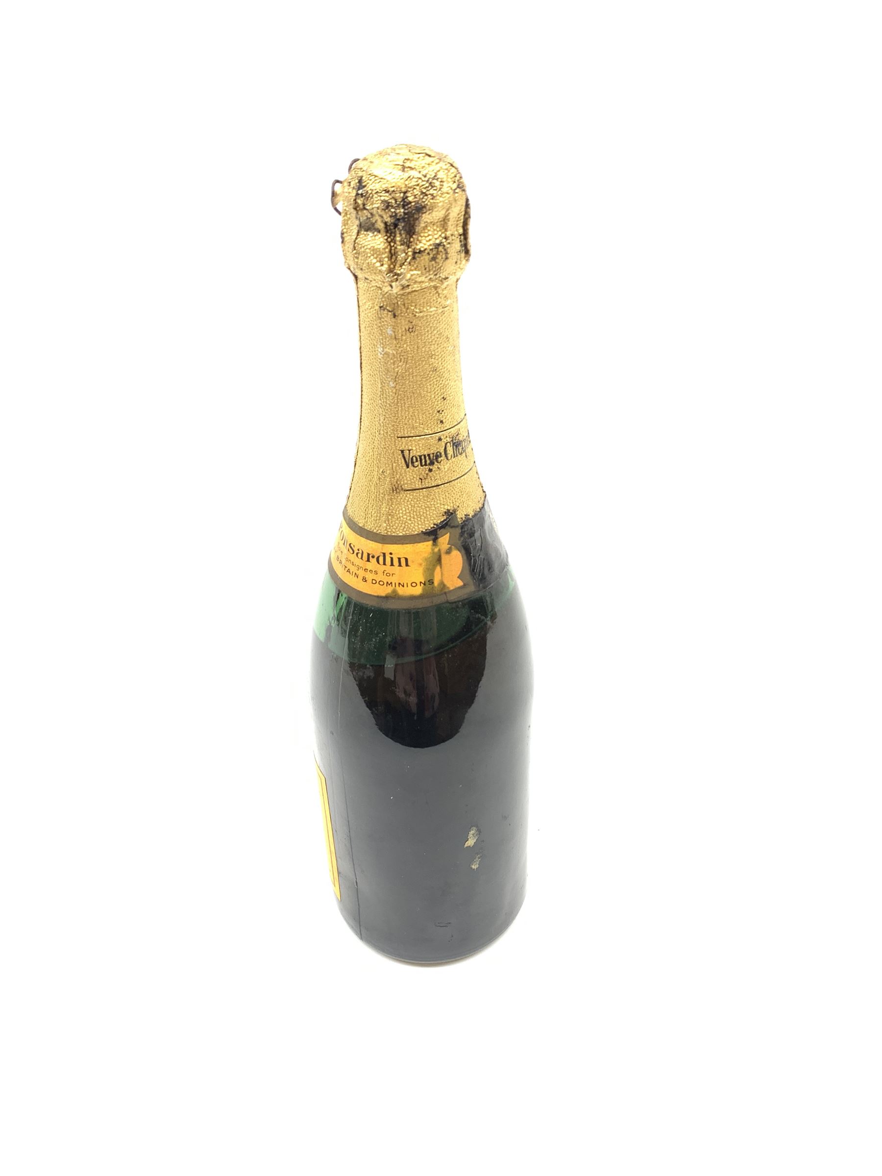 One bottle of Veuve Clicquot Ponsardin 1947 dry champagne, foil seal partially damaged, level below label