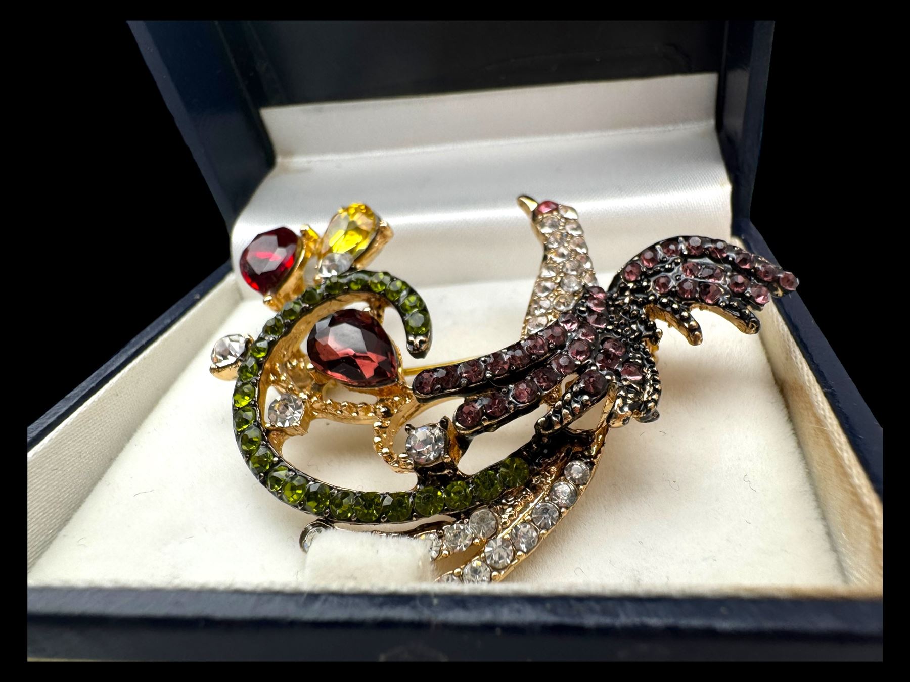 Four pairs of 9ct gold stud earrings, silver stone set stud earrings and a collection of costume jewellery brooches and bead necklaces