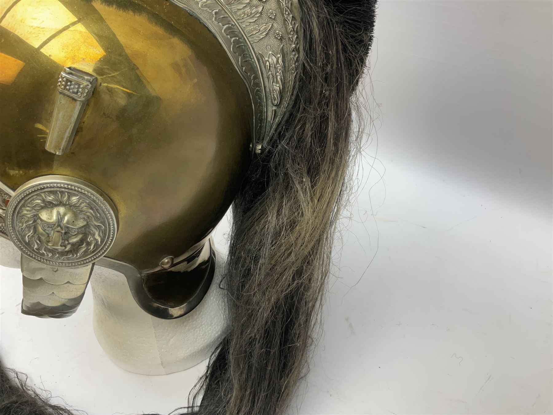 French Model 1913 mounted gendarmerie helmet; brass bodied with nickel mounts, chin strap, comb and horse-hair H27cm (no liner)