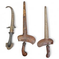 Malayan Kris with hardwood grip and scabbard, another and a Middle Eastern jambiya with decorative brass and silvered metal sheath (3)