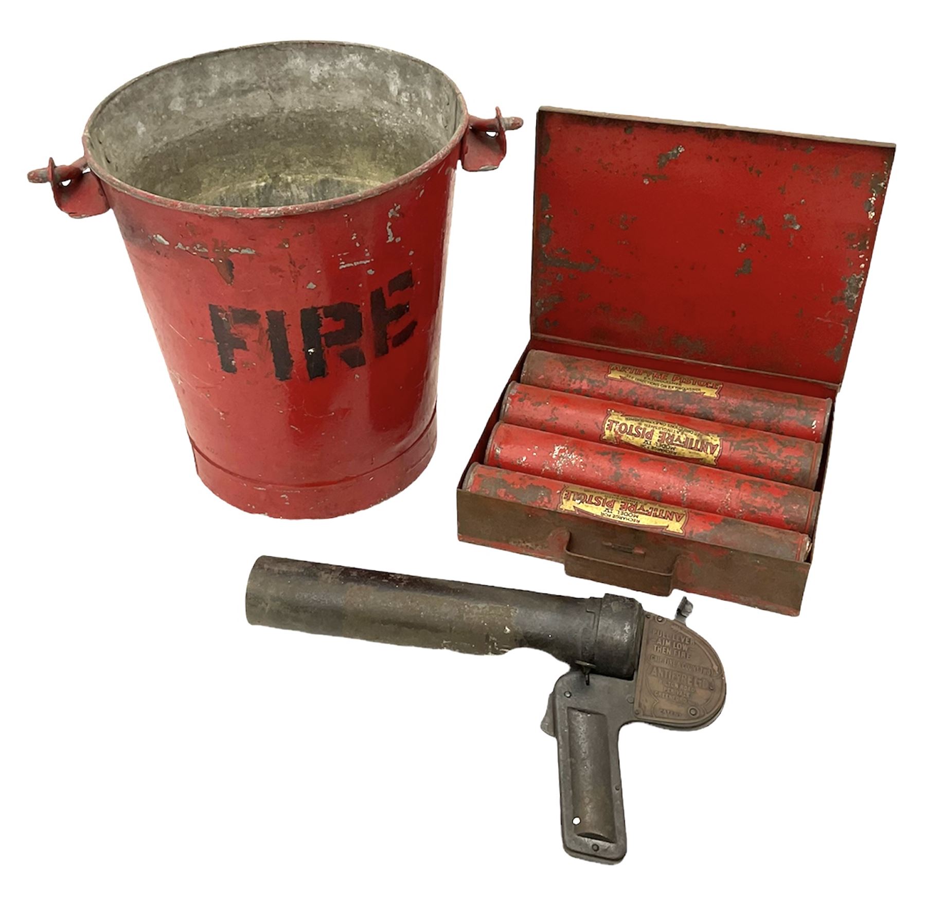 Antifyre Pistole fire extinguisher grenade launcher together with four cartridges (one lacking contents) in original storage tin, together with a red painted fire bucket