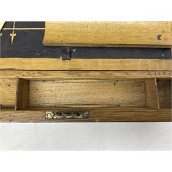 Oak writing slope, the hinged lid with inlaid brass vacant cartouche opening to reveal black gilt tooled leather, with key, L40cm