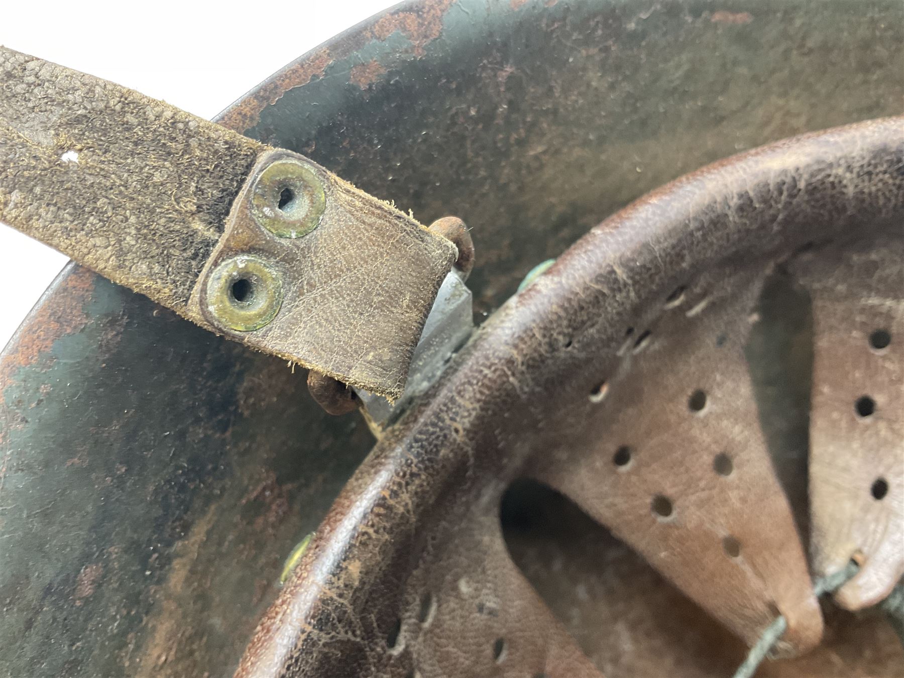 WWII Italian steel helmet with liner and chin strap