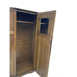 Early to mid 20th century oak hall wardrobe, single door with linenfold panel