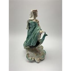 18th Century Derby porcelain figure, modelled as Juno stood with peacock at her feet, upon a gilt detailed scrolling base, with patch marks beneath, H18.5cm