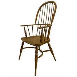 Georgian style light elm Windsor armchair, high comb back, saddle seat, crinoline stretcher base