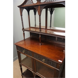  Edwardian mahogany cabinet, pierced swan neck pediment above bevelled edge mirrors, two blind fret work drawers and two glazed doors, square tapered supports, joined under tier, W91cm, H183cm, D47cm  