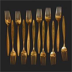 Extensive suite of WMF 800 silver gilt cutlery, for twelve covers, comprising twelve table knives and forks, fish knives and forks, dessert forks, table spoons, dessert spoons, teaspoons, eleven dessert forks and six serving spoons, with crescent moon and crown WMF hallmarks