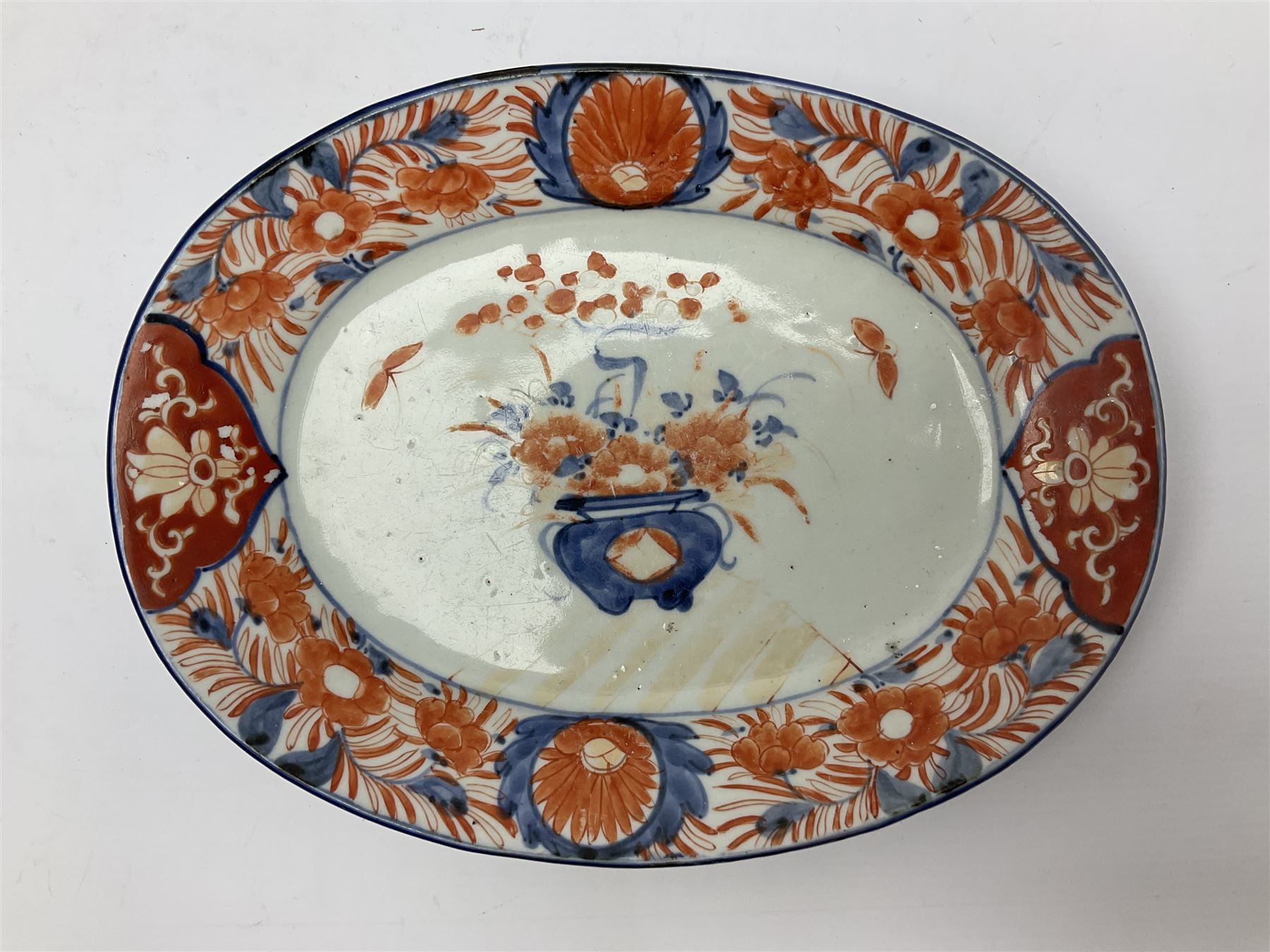 Two 19th century Japanese Imari pattern oval charger together with another circular Imari charger, circular charger D31cm 