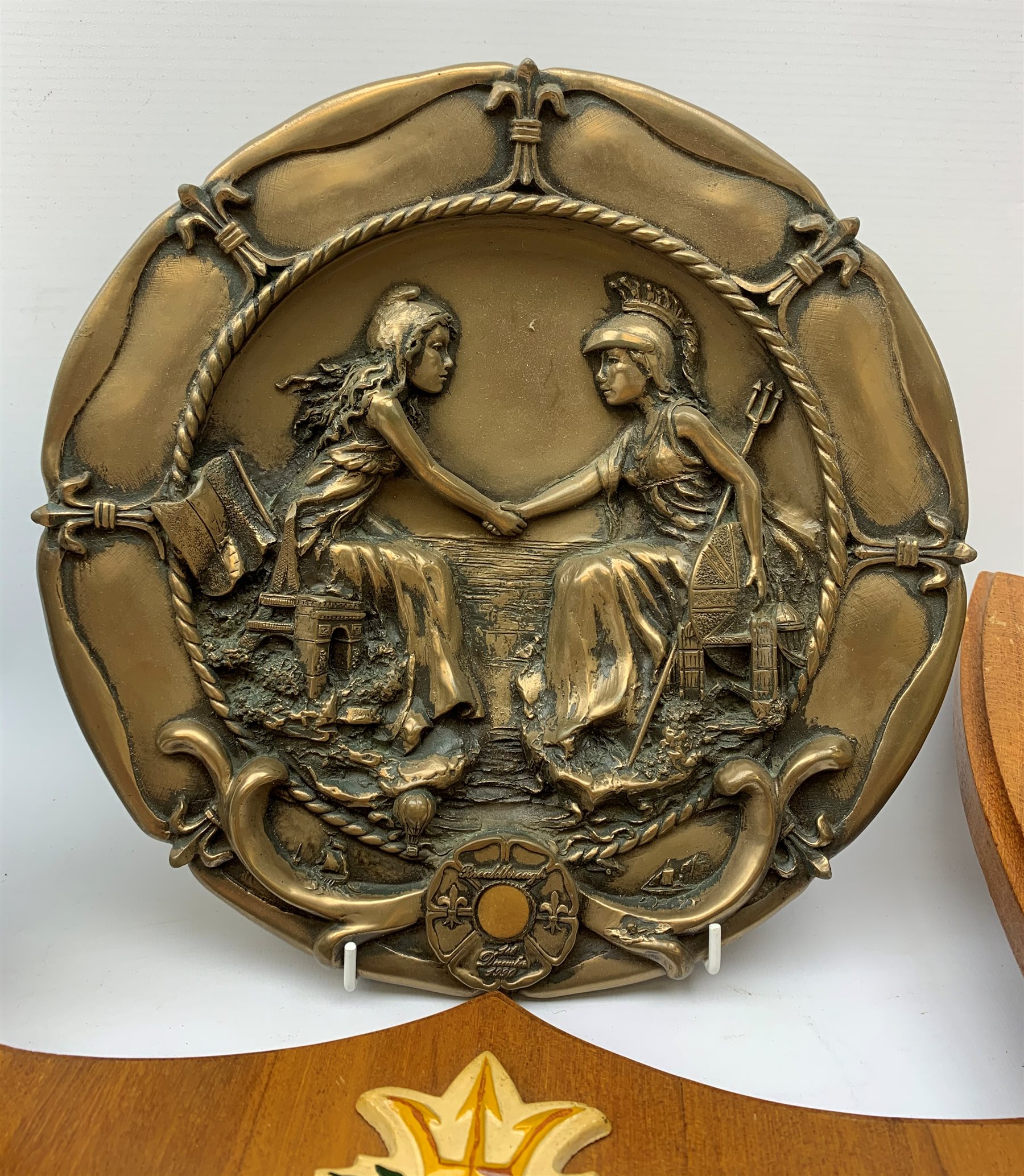  Two Submarine Force US Atlantic Fleet presentation plaques, the first detailed Subron 14, the second USS Abraham Lincoln 602, each H32.5cm, together with five uniform patches, four cap tallies, detailed HSM Tamar (x3), and HMS Ganges, and a set of two limited edition Euro Tunnel commemorative presentation plaques, The Breakthrough 1st December 1990 and Celebration 6th May 1994, D27cm, complete with original certificates.  