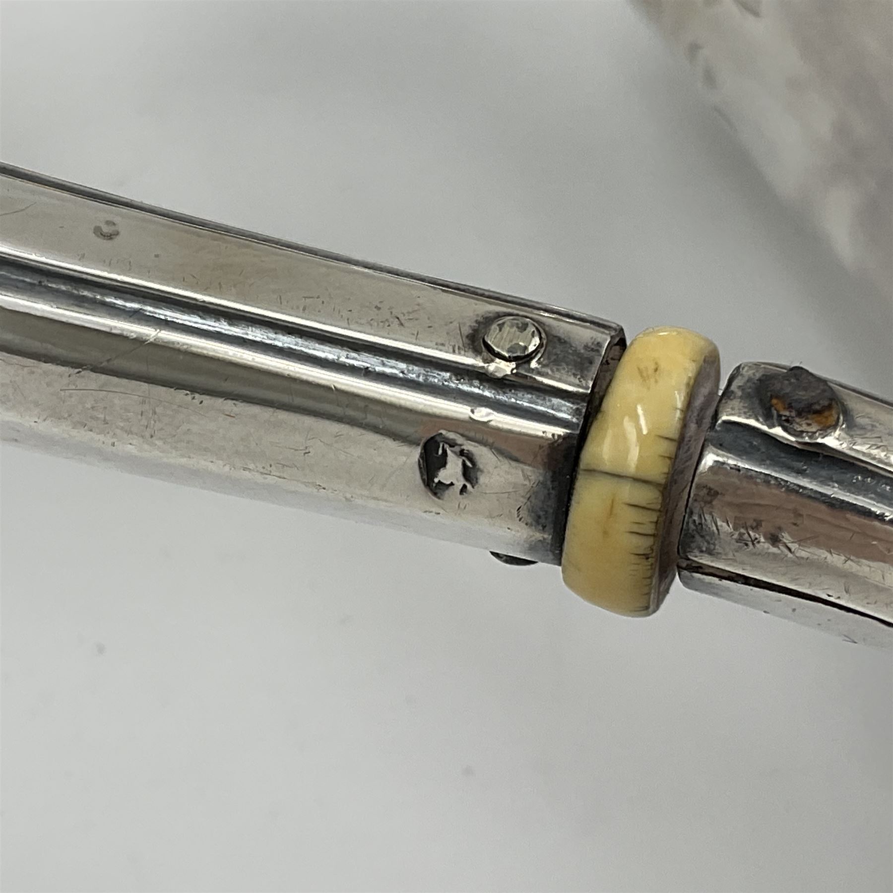 Victorian three-piece silver tea service, comprising teapot, twin handled open sucrier and milk jug, of oval form with shaped rim and C handles, each engraved with crests and bands of strapwork decoration, the milk jug and sucrier with gilt interiors, hallmarked Josiah Williams & Co, Exeter 1881, the teapot with ivory insulators and finial, all contained with a tooled leather, blue silk and velvet lined fitted case, retailed by West & Sun, Dublin 
This item has been registered for sale under Section 10 of the APHA Ivory Act