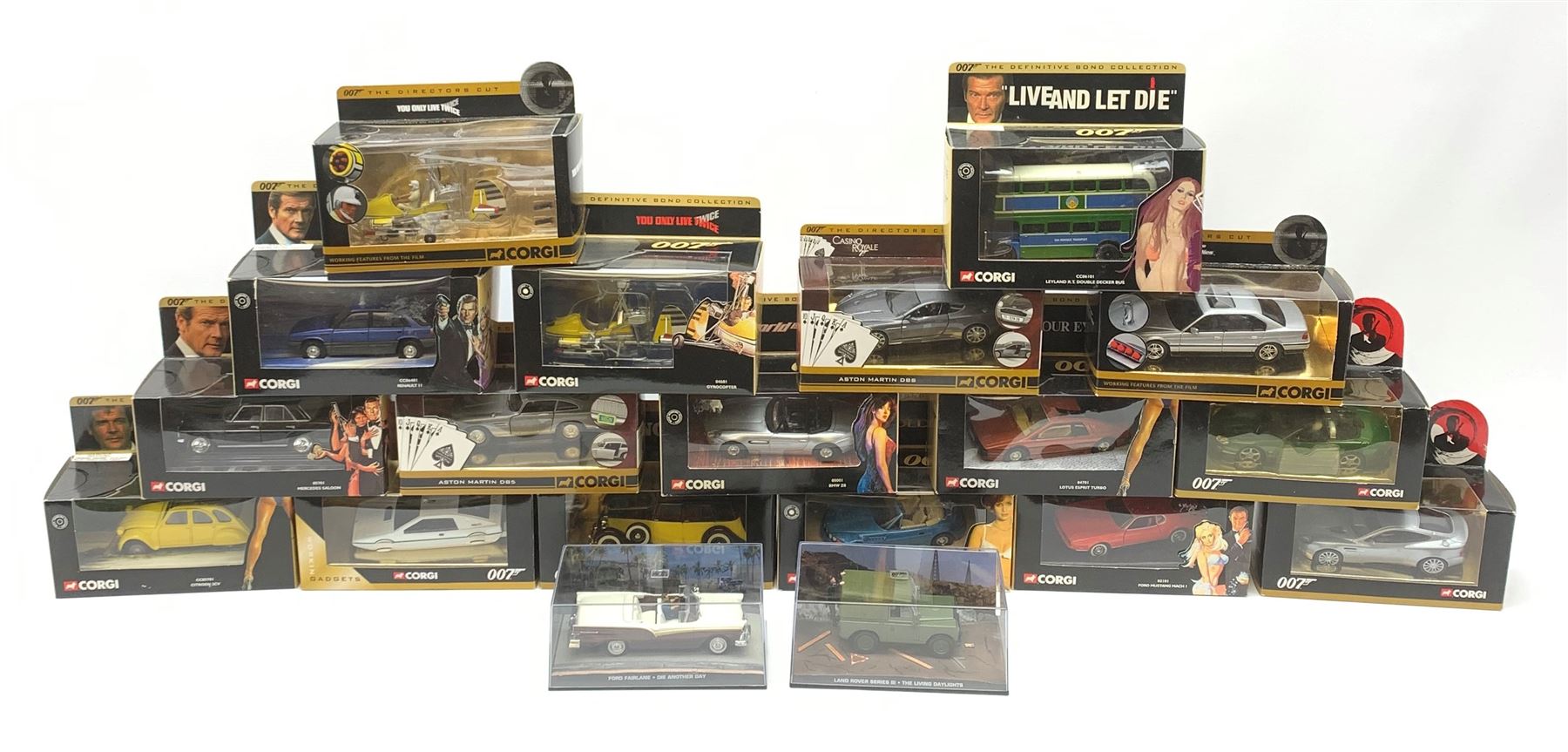 Corgi James Bond - seventeen models from various films including Goldfinger, Octopussy, Diamonds Are Forever, For Your Eyes Only, Casino Royale, Live And Let Die, You Only Live Twice etc including ten from The Definitive Bond Collection and seven from The Director's Cut, all in window boxes; together with two others by Fabbri in perspex display cases (19)